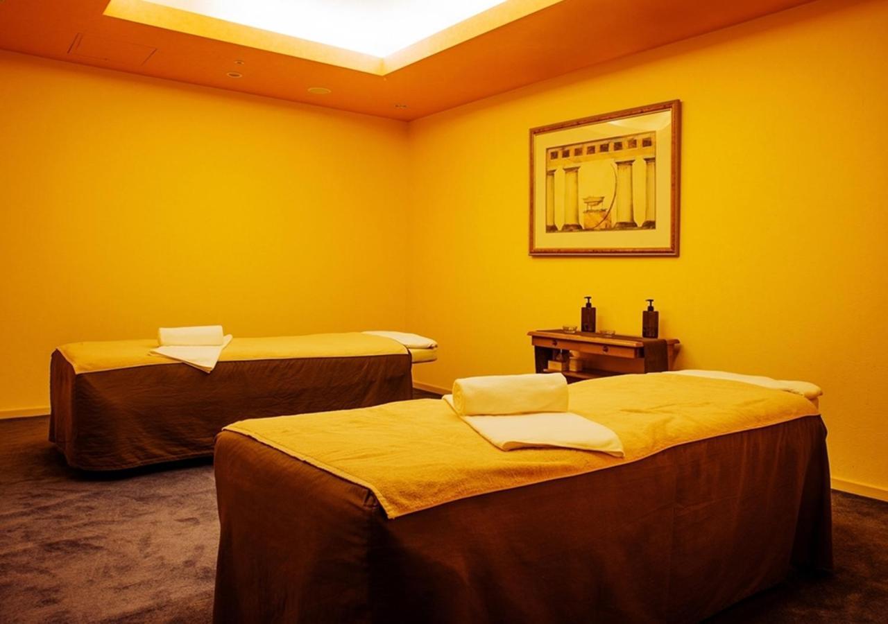 Hotel Emisia Саппоро Экстерьер фото A massage room at a spa
